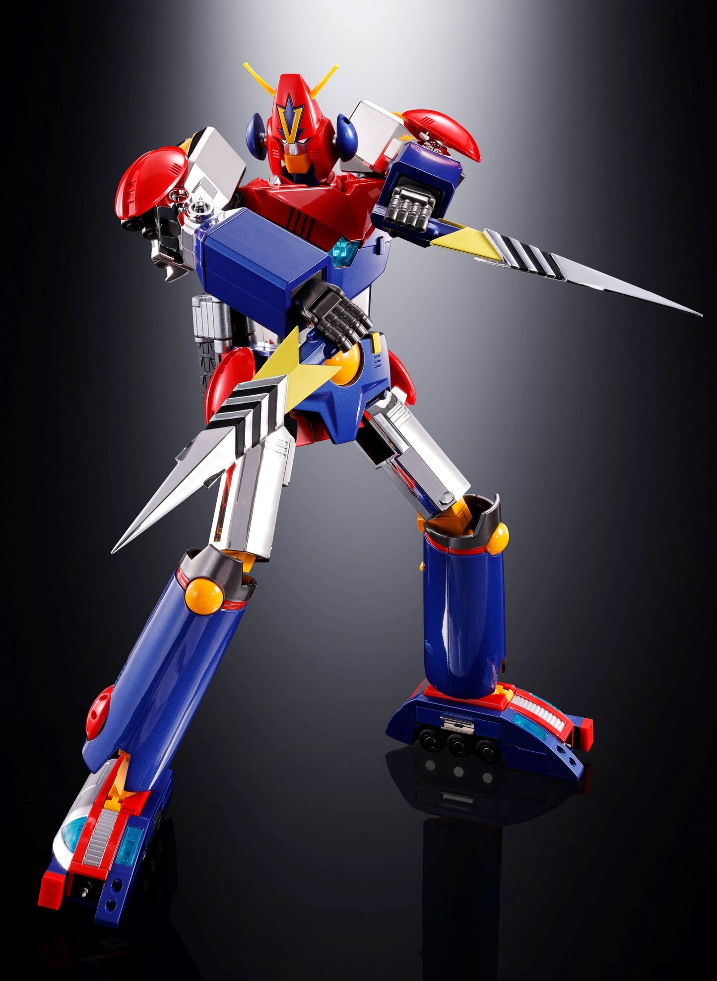 GX-50SP COM-BATTLER V holding 2 spears